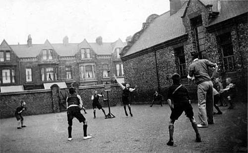 Class V16 Oxbridge Lane boys playing stoolball in Stockton-on-Tees in July 1932